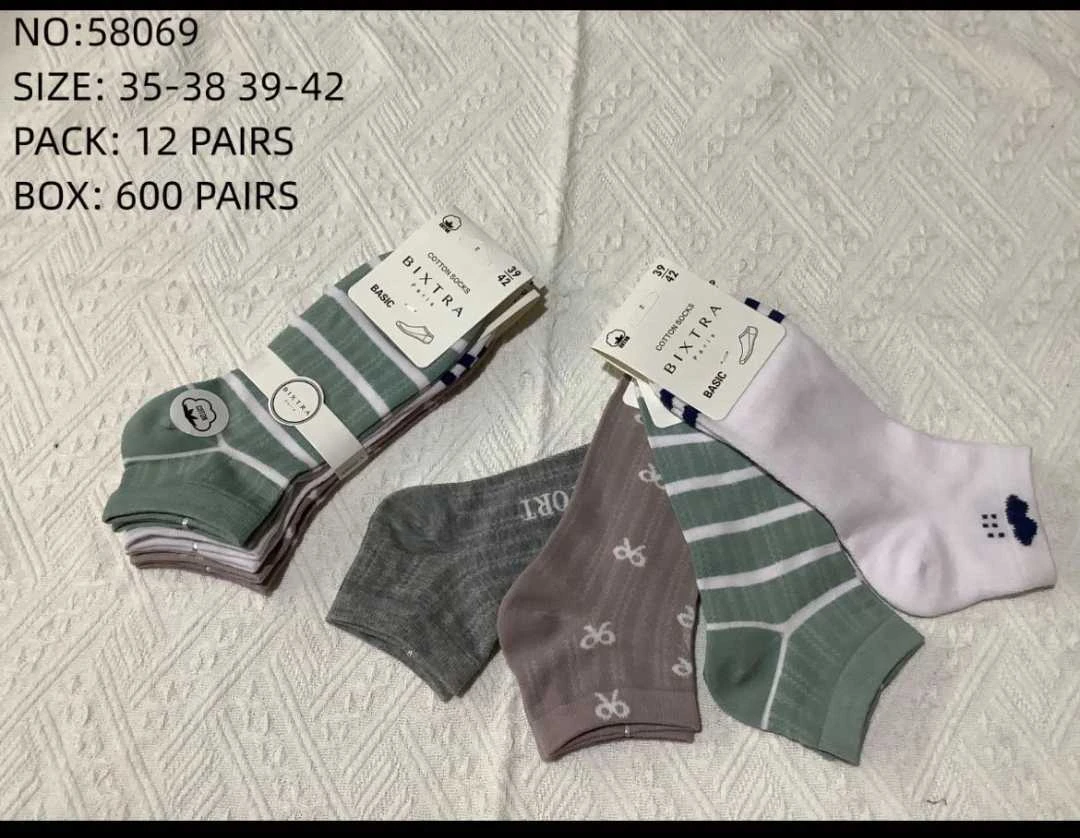 1 Paquet De 12 Paires Chaussettes Colorées Femme Motifs (x2) 1 1 Paquet De 12 Paires Chaussettes Colorées Femme Motifs (x2)